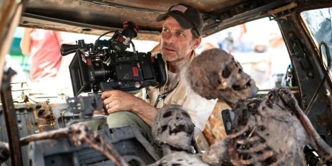 Zack Snyder mediterer over liv og død sammen med et skjelett under innspillingen av "Army of the Dead".